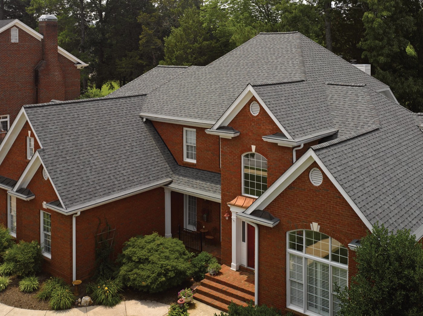 CertainTeed Landmark ClimateFlex shingles shown on a home, manufacturer product photo
