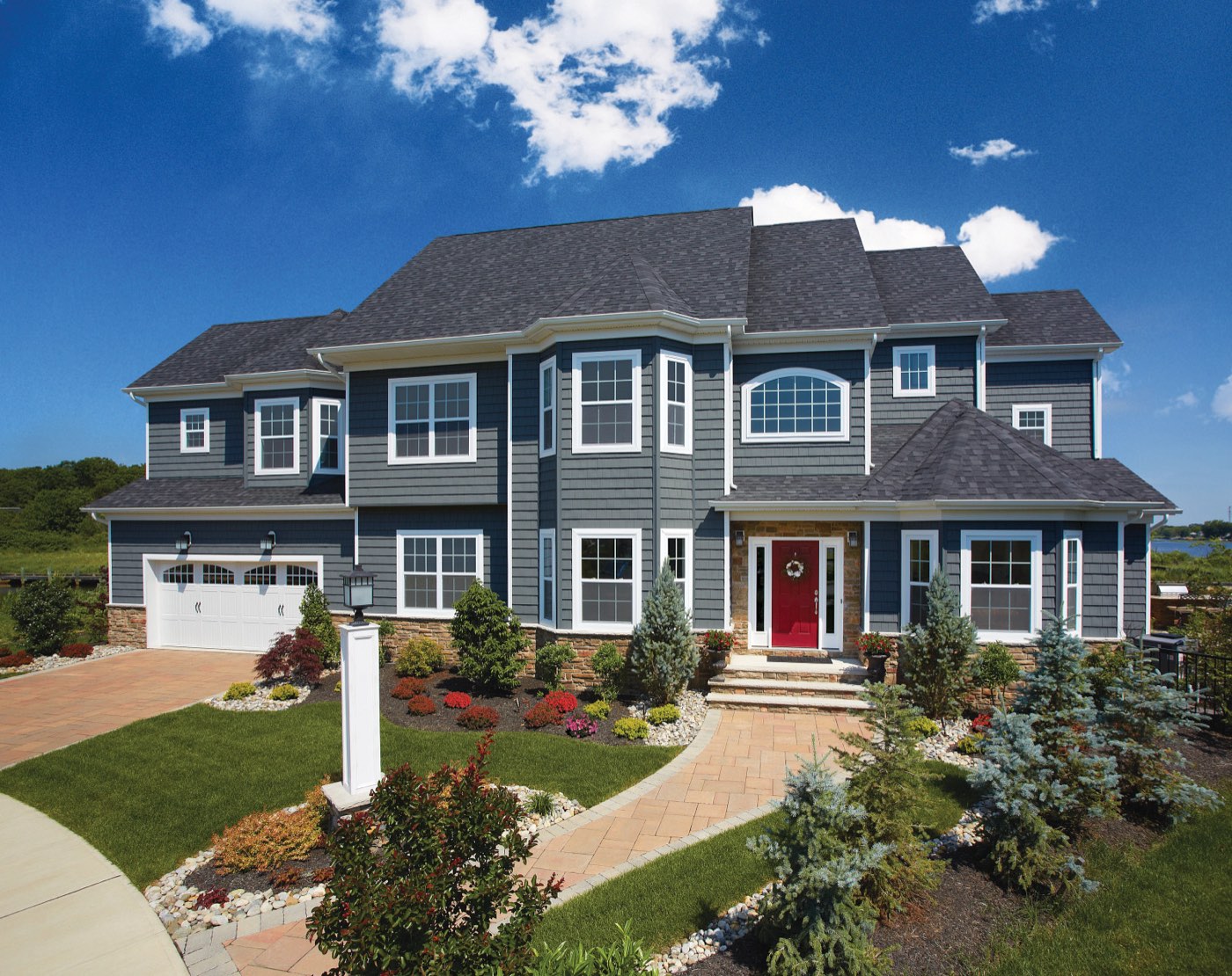 CertainTeed Landmark Premium shingles shown on a home, manufacturer product photo